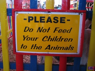 I've been to the fair only about a half a dozen times, and I have never seen this sign.  It made me laugh.