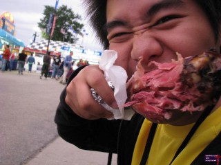 I just love this picture.  It didn't take long for Holy to decide what food he wanted to try at the fair.